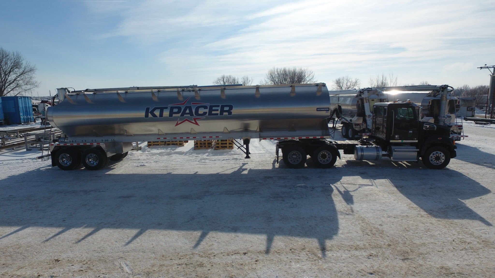 kt pacer logo on side of full truck